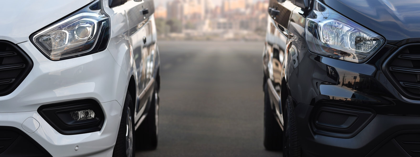 twovehicles lease vans side by side