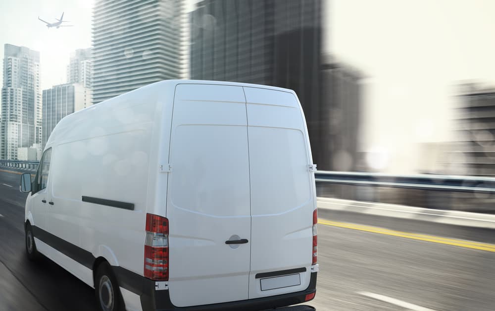 back view of a white ford transit lwb